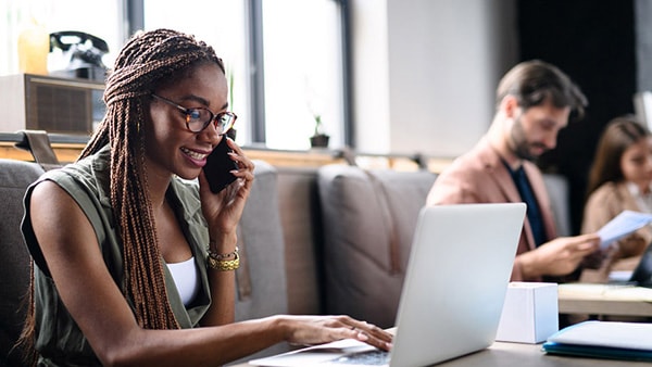 Woman on laptop securely connected to the network