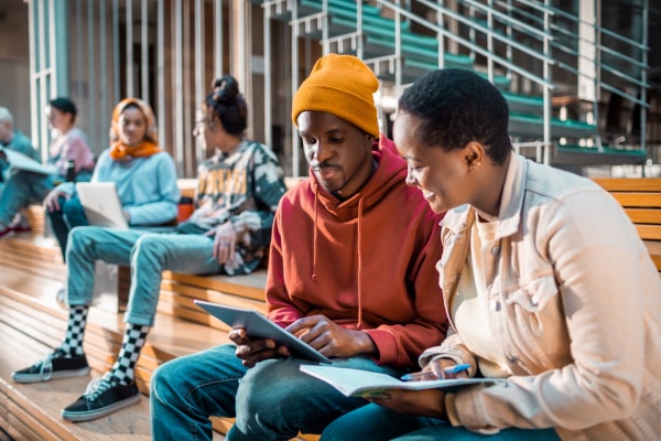 Two students looking at iPad